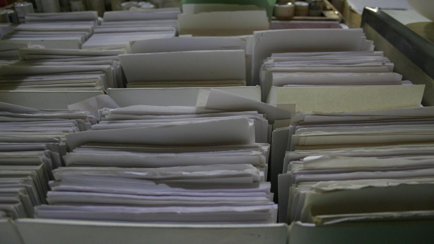 How Many Sheets of Paper Together Weigh 1 Ounce?