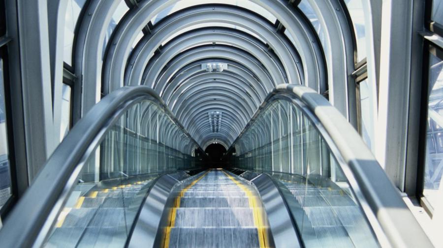What Does the Phrase "glass Escalator" Mean in Sociology?